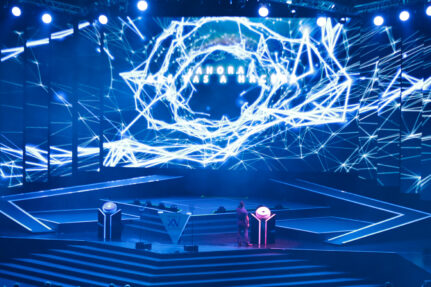 escenario ilumindo con escaleras y rampas en magno evento mexico siglo xxi para fundacion telmex telcel