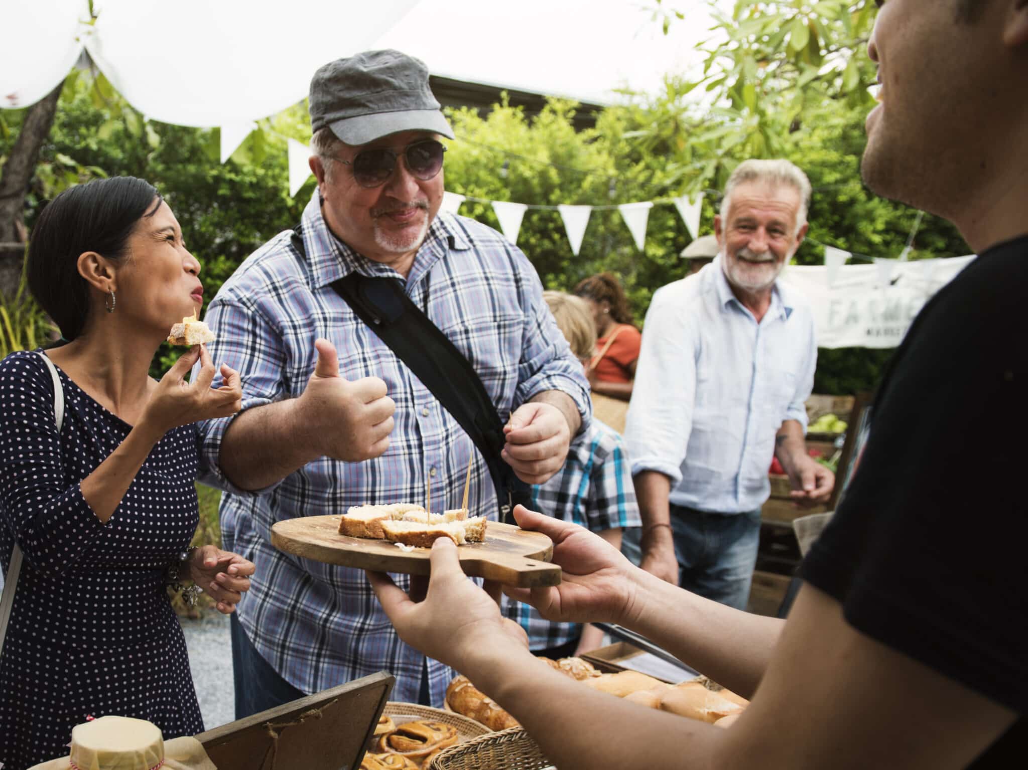 Diverse,People,Eating,Testing,Sample,Homemade,Bread